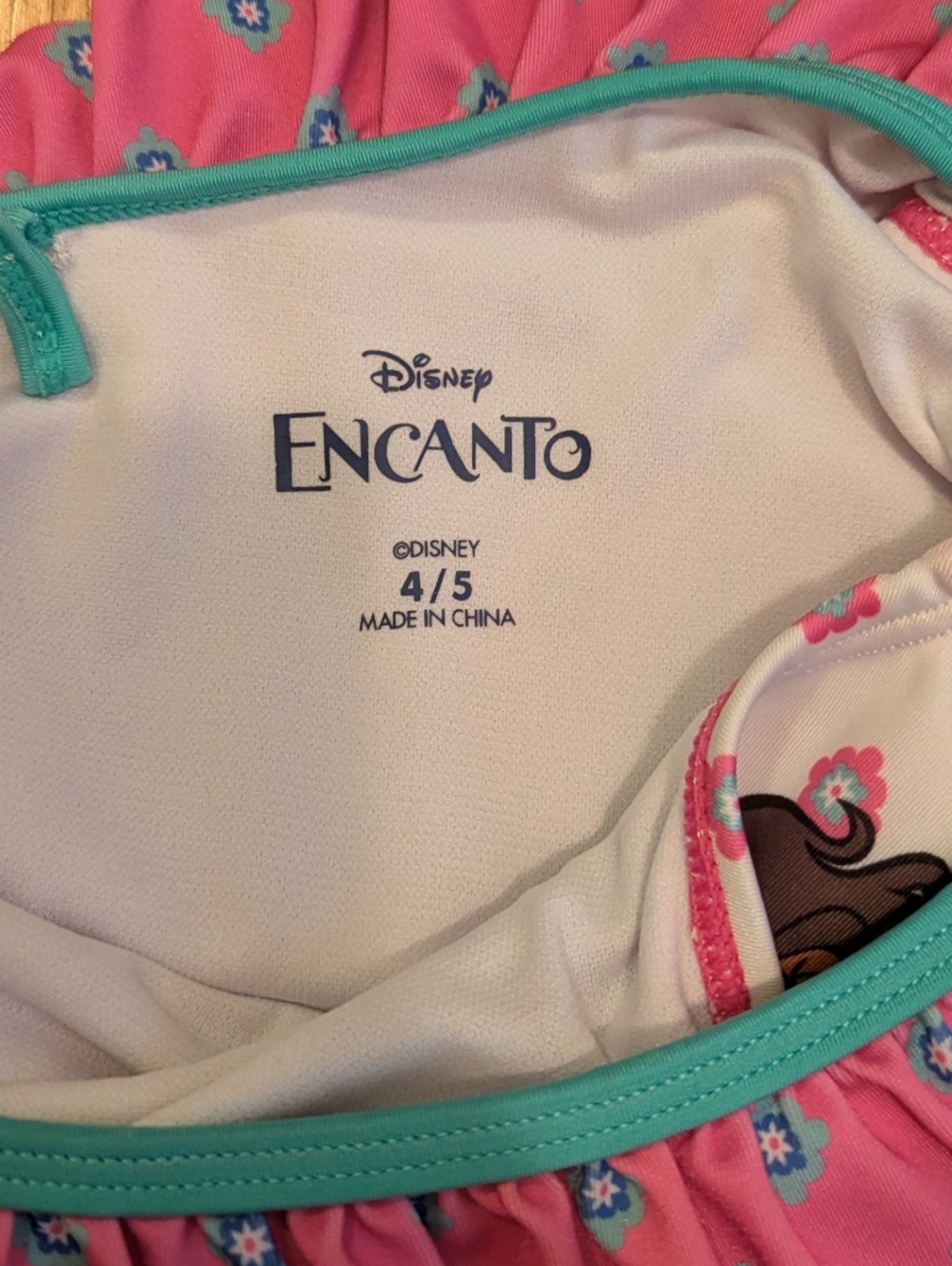 Disney Encanto Pink Floral Girls Swimsuit with Teal Trim - Picture 4 of 4